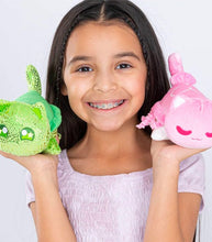 Load image into Gallery viewer, Girl holding Aphmau MeeMeows Mystery Plush toys, Under The Sea Litter 5, featuring green and pink plushies.