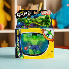 Load image into Gallery viewer, Goo Jit Zu Mega Glow Hulk action figure in packaging, glow-in-the-dark, stretchable, durable.