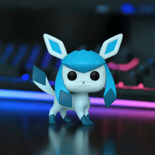 Load image into Gallery viewer, Glaceon Pokemon POP! Vinyl figure with icy blue design, showcasing intricate patterns and expressive eyes on a dark background.
