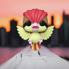 Load image into Gallery viewer, Pidgeotto Pokemon POP! Vinyl Figure displayed with city skyline backdrop.