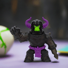 Load image into Gallery viewer, Goo Jit Zu Stretch Strikers - Ultra Rare Black Knight Orbitox toy figure with dark armor and purple accents.