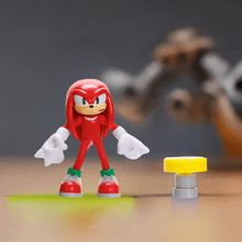 Load image into Gallery viewer, Knuckles figure with spring accessory from Sonic the Hedgehog series.