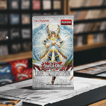 Load image into Gallery viewer, Yu-Gi-Oh! Light Of Destruction Booster Reprint Unlimited Edition pack featuring iconic card artwork, displayed on a store counter.