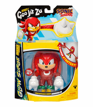 Load image into Gallery viewer, Goo Jit Zu Sonic Glow Surge Knuckles figure with glow-in-the-dark feature and stretchy ability.