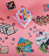 Load image into Gallery viewer, Unicorns Game set up with illustrated cards and tokens on a pink background.