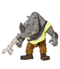 Load image into Gallery viewer, Teenage Mutant Ninja Turtles Movie Rocksteady action figure with blaster and weapons rack.