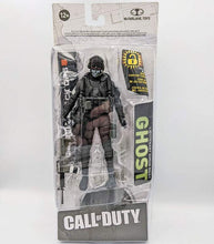 Load image into Gallery viewer, Call of Duty Ghost action figure in window box packaging with accessories and articulation.