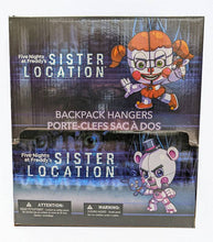 Load image into Gallery viewer, Five Nights at Freddy's Sister Location hangers display box featuring Circus Baby and Funtime Foxy.