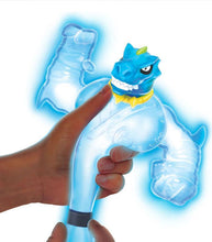 Load image into Gallery viewer, Goo Jit Zu Glow Shifters Tyro toy being stretched and squeezed, glowing blue in the dark.