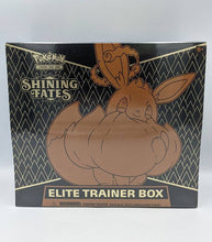 Load image into Gallery viewer, Pokémon TCG Shining Fates Elite Trainer Box featuring Eevee VMax promo card and booster packs.