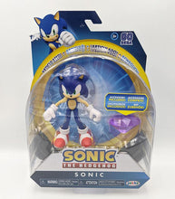 Load image into Gallery viewer, Sonic the Hedgehog 4 inch figure with purple chaos emerald in packaging.