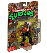 Load image into Gallery viewer, Teenage Mutant Ninja Turtles Classic Bebop action figure in packaging with weapons.