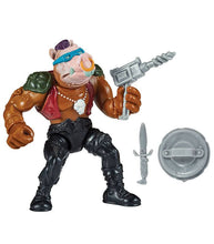 Load image into Gallery viewer, Teenage Mutant Ninja Turtles Classic Bebop action figure with weapons and articulation.