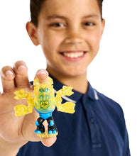 Load image into Gallery viewer, Child holding Legends of Akedo Power Storm Battle Giants Thoraxis toy.
