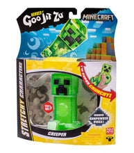 Load image into Gallery viewer, Heroes of Goo Jit Zu Minecraft Creeper toy in packaging, showcasing stretchy and gooey features with classic Minecraft design.
