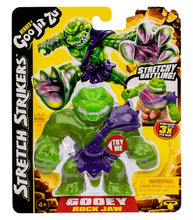 Load image into Gallery viewer, Heroes of Goo Jit Zu Stretch Strikers Rock Jaw figure in retail packaging with vibrant design.
