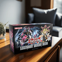 Load image into Gallery viewer, Yu-Gi-Oh! Legendary Dragon Decks Reprint Unlimited Edition box on a table with dragon artwork.
