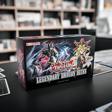 Load image into Gallery viewer, Yu-Gi-Oh! Legendary Dragon Decks Reprint Unlimited Edition box displayed on a table.
