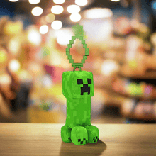 Load image into Gallery viewer, Minecraft 5 Inch Creeper Bag Hanger Plush with clip, featuring soft pixelated design.
