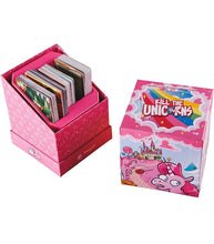 Load image into Gallery viewer, Kill The Unicorns Game box with cards displayed, featuring whimsical unicorn designs on packaging.
