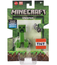 Load image into Gallery viewer, Minecraft Creeper and TNT action figure set in packaging.
