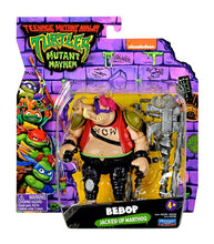 Load image into Gallery viewer, Teenage Mutant Ninja Turtles Movie Bebop Action Figure in Mutant Mayhem packaging with accessories.
