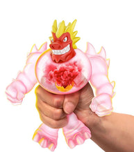 Load image into Gallery viewer, Heroes of Goo Jit Zu Goo Shifters Blazagon toy being squeezed, showcasing its stretchy and color-changing features.
