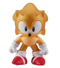 Load image into Gallery viewer, Stretch Armstrong Gold Sonic the Hedgehog toy, super-stretchy and gold-colored, ideal for imaginative play.
