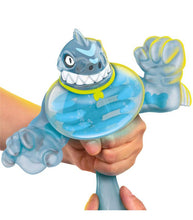 Load image into Gallery viewer, Goo Jit Zu Dino X-Ray Thrash action figure being stretched.

