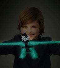 Load image into Gallery viewer, Goo Jit Zu Glow Shifters Bengal toy glowing in a child's hands.
