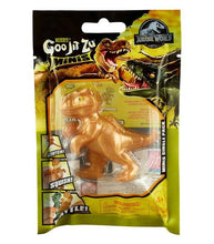 Load image into Gallery viewer, Goo Jit Zu Jurassic World Minis - Giganotosaurus Gold stretch toy for kids.
