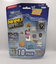 Load image into Gallery viewer, Nanobytes 10 Pack - Gold Star Set in packaging with various collectible items and QR code for Byte World.
