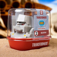 Load image into Gallery viewer, TUBBZ Transformers Megatron Collectible Duck in box, featuring Megatron's signature design and colors, on display.
